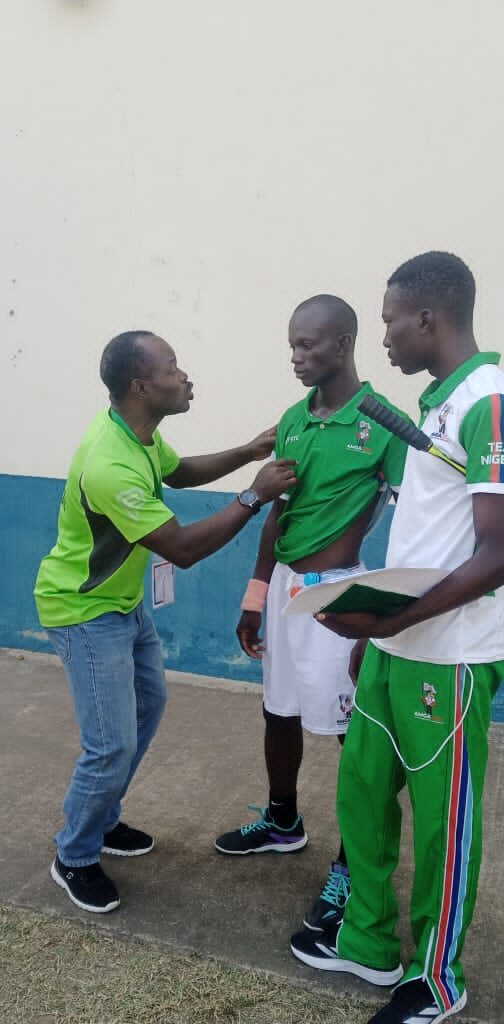 Coarch Benard Mkpe Richard on the sideline with squash at AMGA 2024-parliamentvanguard.com 