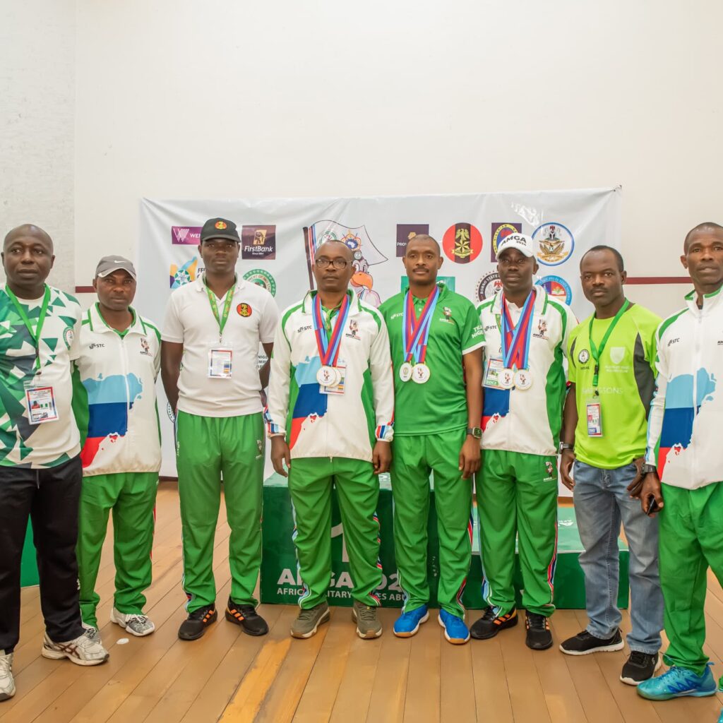 photograph with officials and medalists at AMGA 2024-parliamentvanguard.com