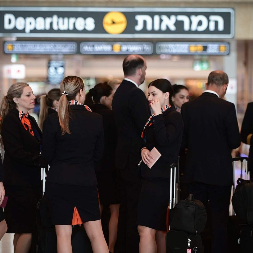 Travelers at Israeli airport-parliamentvanguard.com